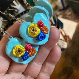 Blue hearts with flowers clay dangle hand made and crafted earrings.